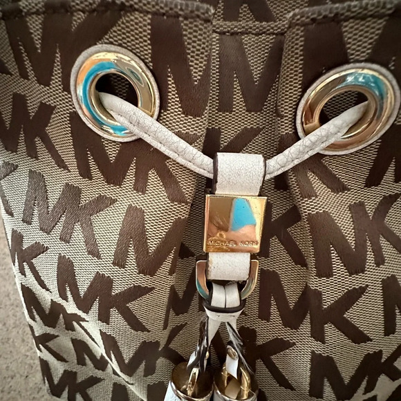 Michael Kors Monogram Drawstring Bucket Brown Mini WithTassel Crossbody Bag - Picture 8 of 14